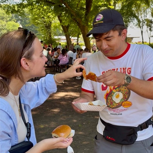 Miguel and Lauren Enjoying Chicken Pastels at Taste of Chicago 2026